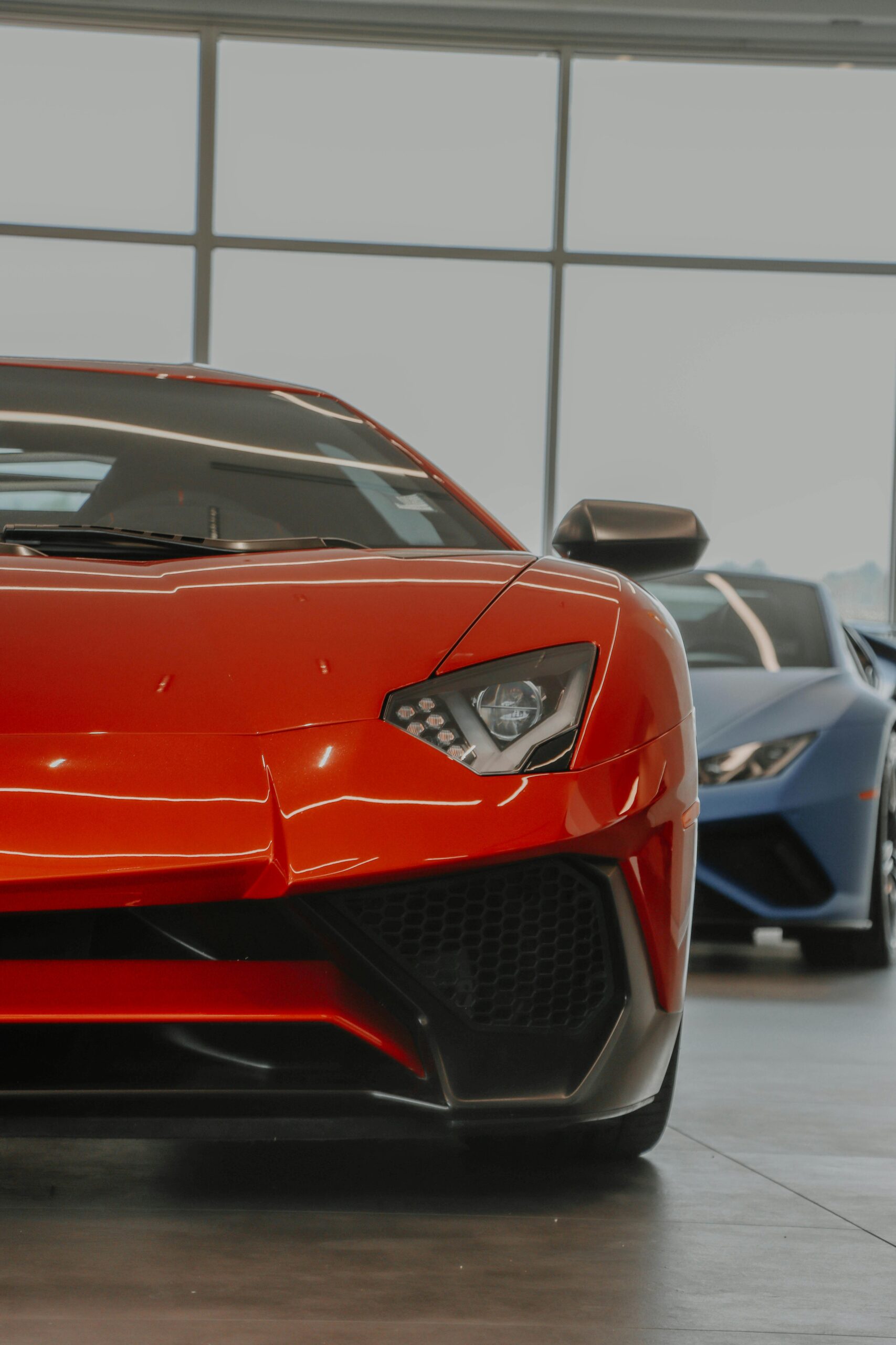 Close-up view of luxury Lamborghini Aventador in a showroom setting.